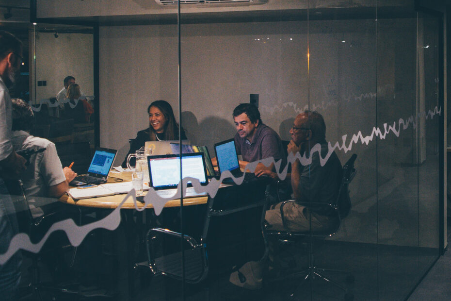 People working on laptops in an office building